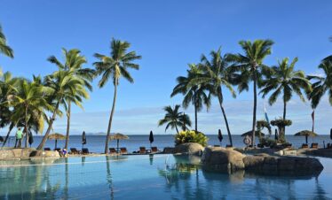 Luxury Goa tour package resort infinity pool sunset view